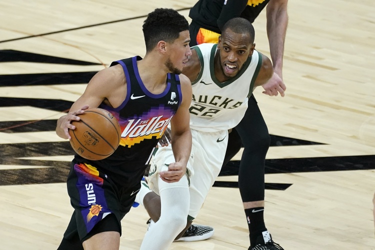 NBA总决赛上演：球星伤病疫情下的逐梦之旅，太阳雄鹿对决